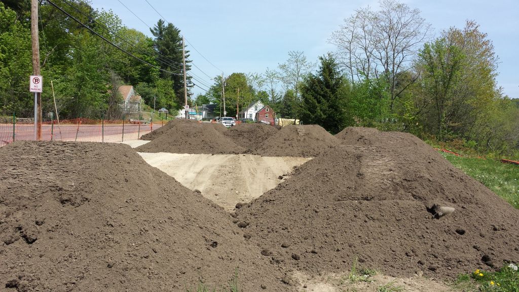 Piles of loam thanks to the Belknap County Master Gardeners in honor of Terry Schneider