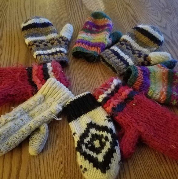 Assorted mittens in a circle